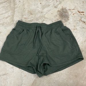 DSG (Dick Sport Goods) green shorts with pockets